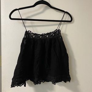 Dainty little black top!